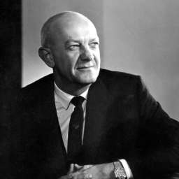 A black-and-white photo of Ewing Marion Kauffman, wearing a suit and tie